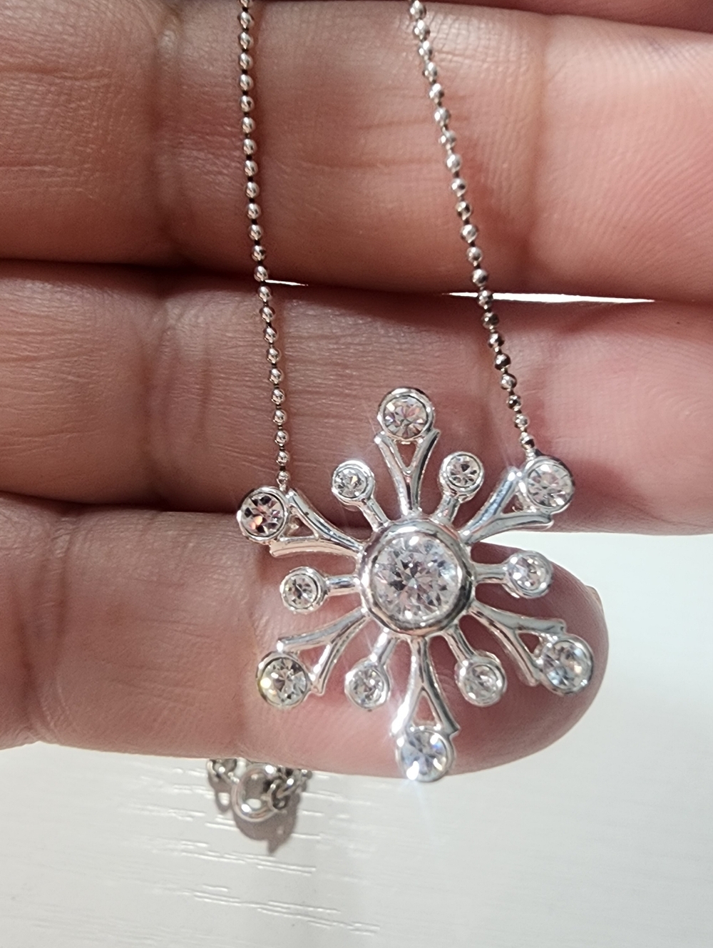 Monet Silver Toned Snowflake Pendant Necklace with Clear Crystals . 16"